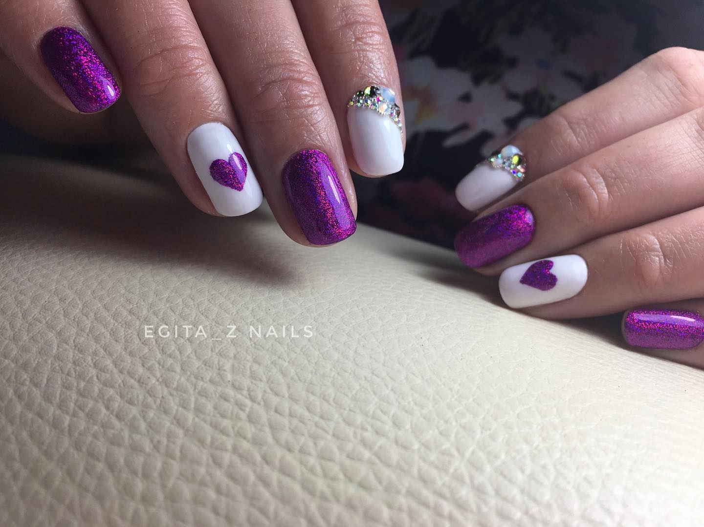 Premium Photo | A purple and white nail art design with a design of a  woman's nails